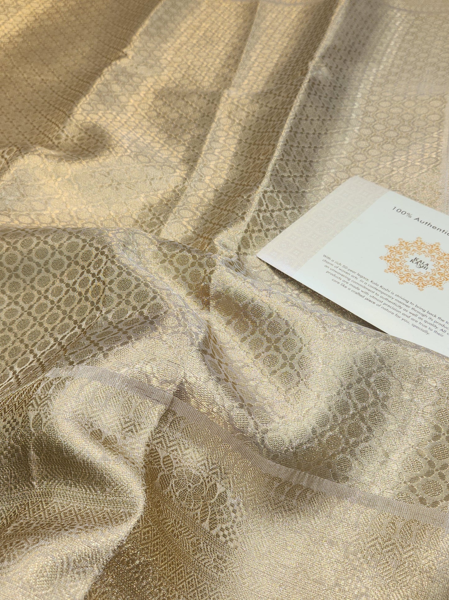 Celebrity Inspired tissue golden embossed tissue silk Saree