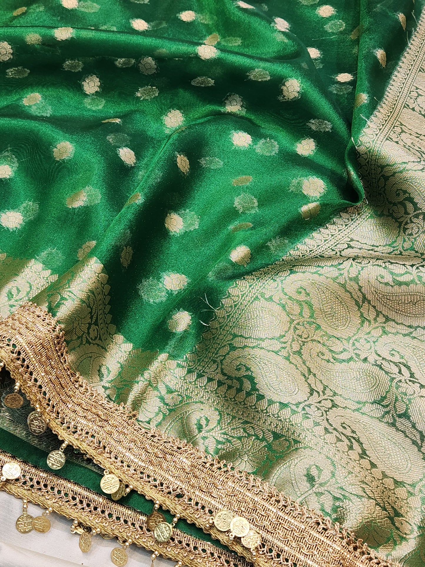 Maharani Collection Tissue silk Green saree With Coin Laces