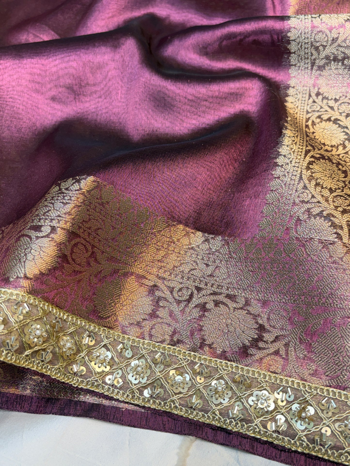 Metallic Purple tissue silk saree with intricate lace work