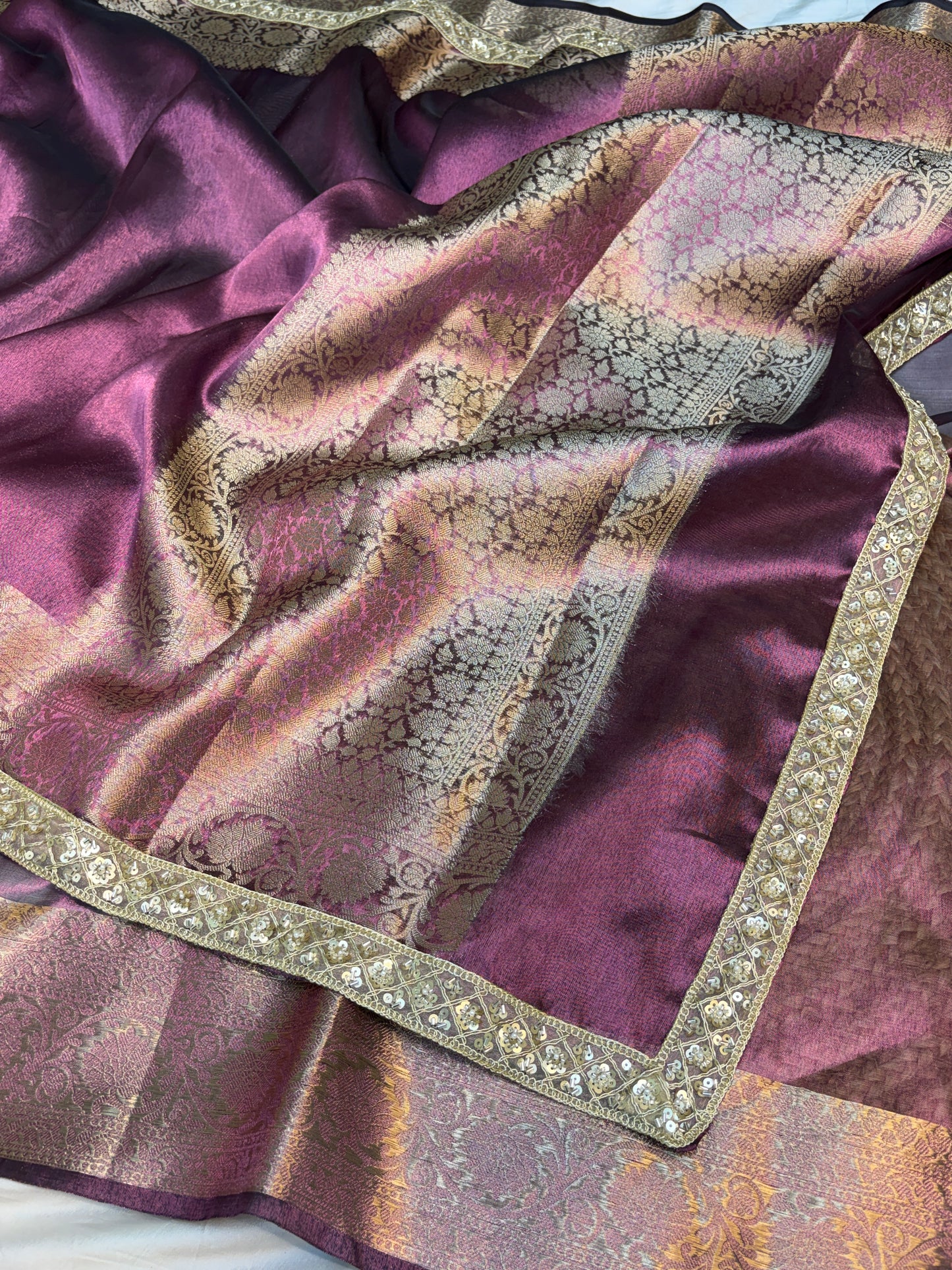 Metallic Purple tissue silk saree with intricate lace work