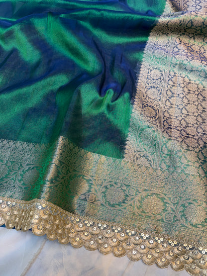 Metallic Peacock tissue silk saree with intricate lace work