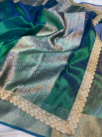 Metallic Peacock tissue silk saree with intricate lace work