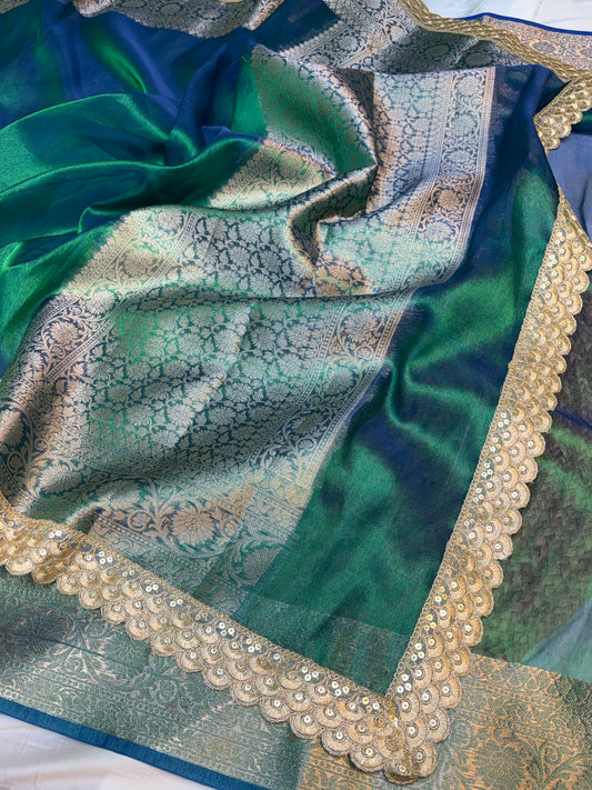 Metallic Peacock tissue silk saree with intricate lace work