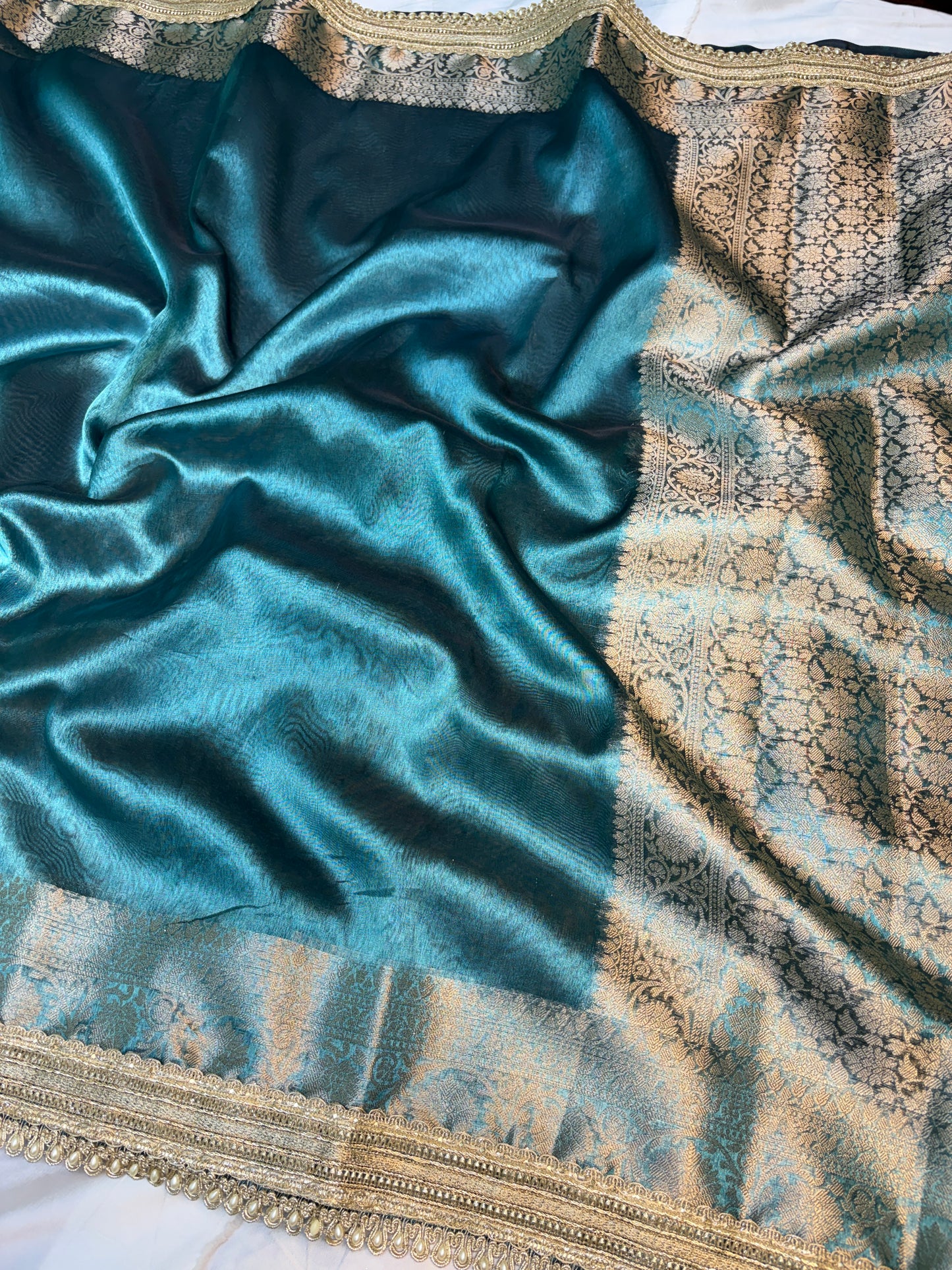 Metallic Blue tissue silk saree with intricate lace work