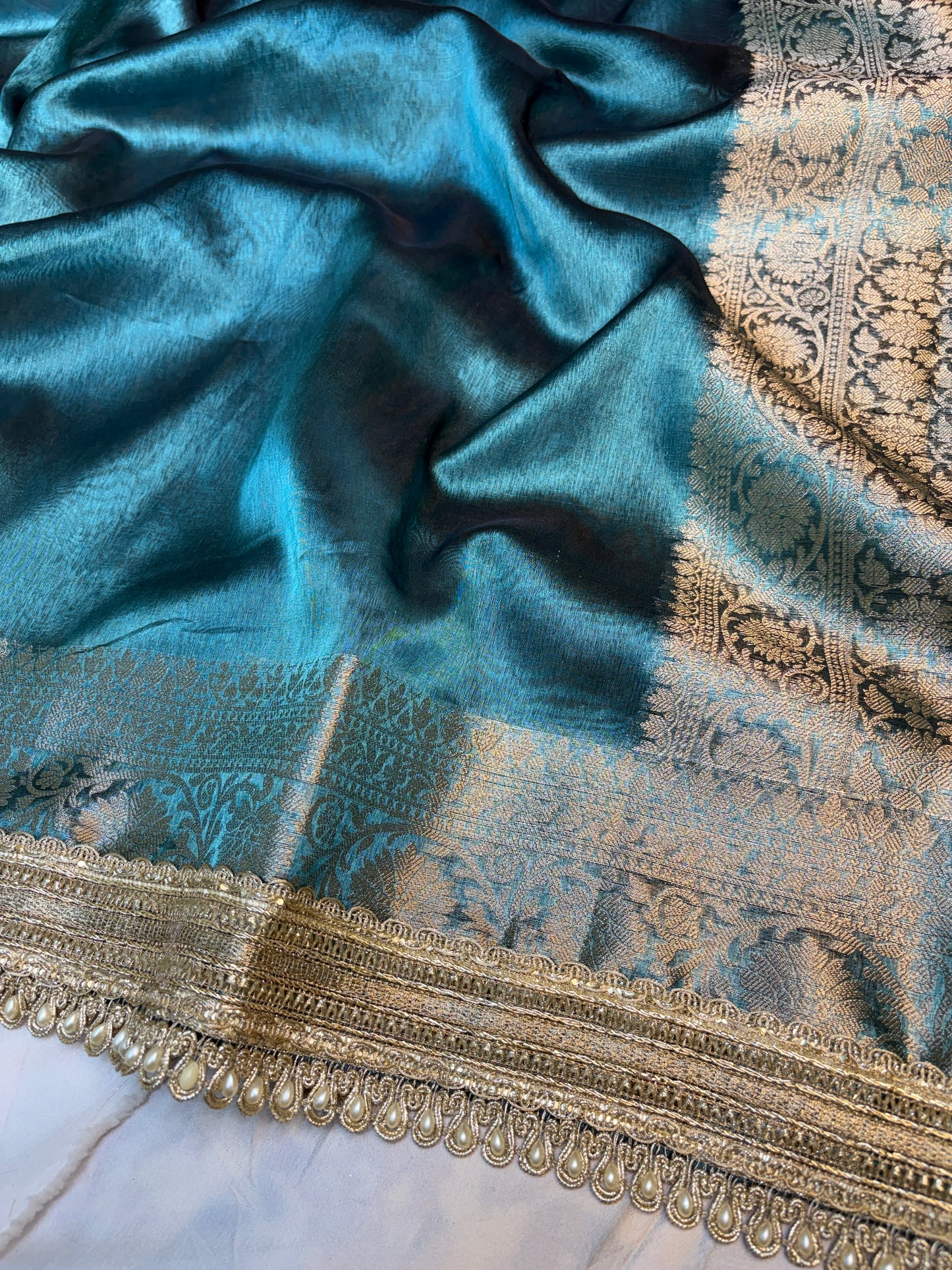 Metallic Blue tissue silk saree with intricate lace work