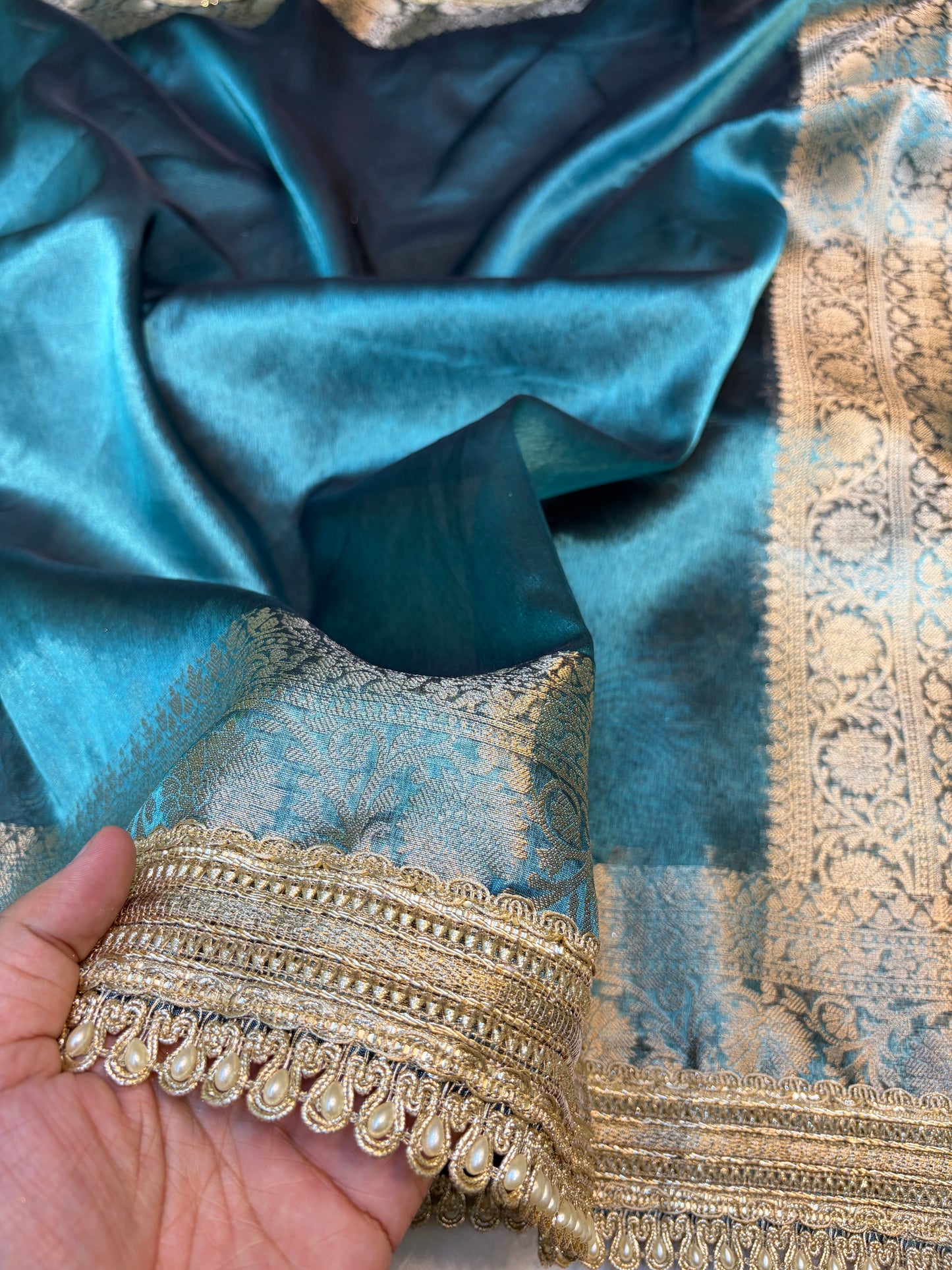 Metallic Blue tissue silk saree with intricate lace work