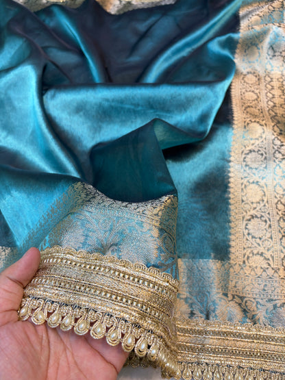 Metallic Blue tissue silk saree with intricate lace work
