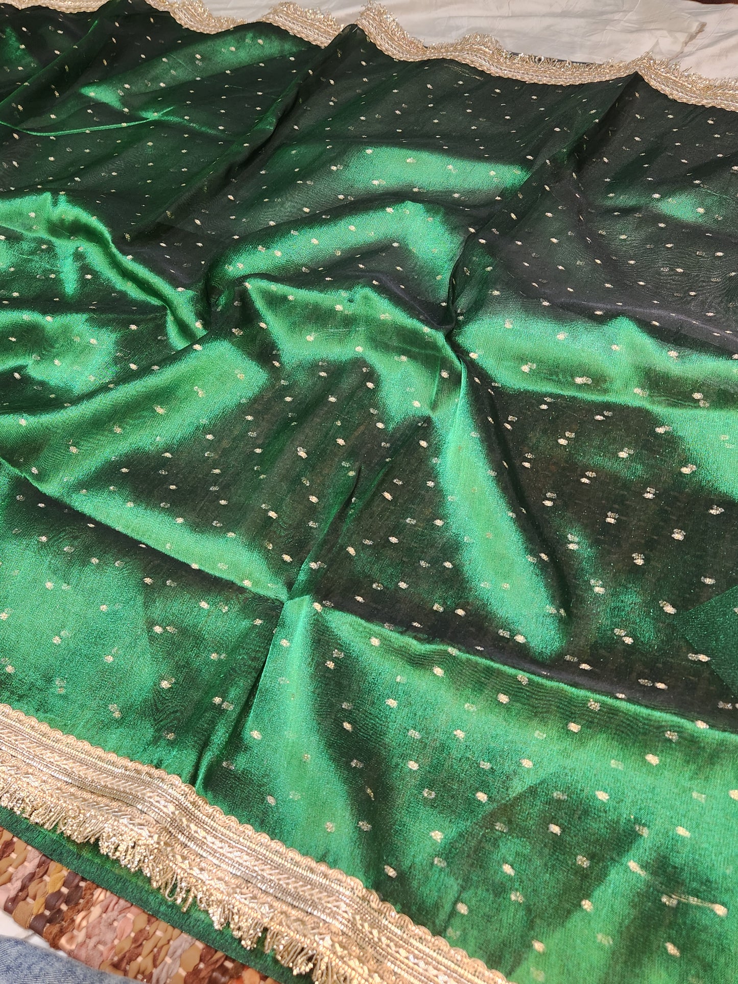 Deep green tissue silk saree