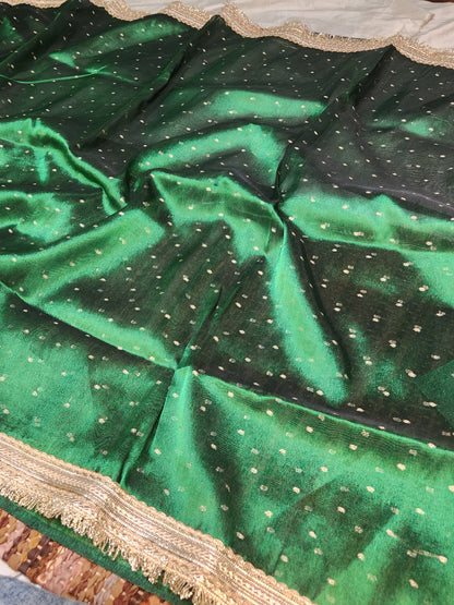 Deep green tissue silk saree