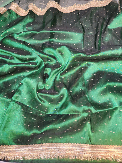 Deep green tissue silk saree